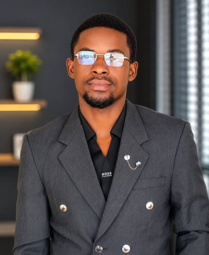 John Kuseni, digital marketer and laptop specialist